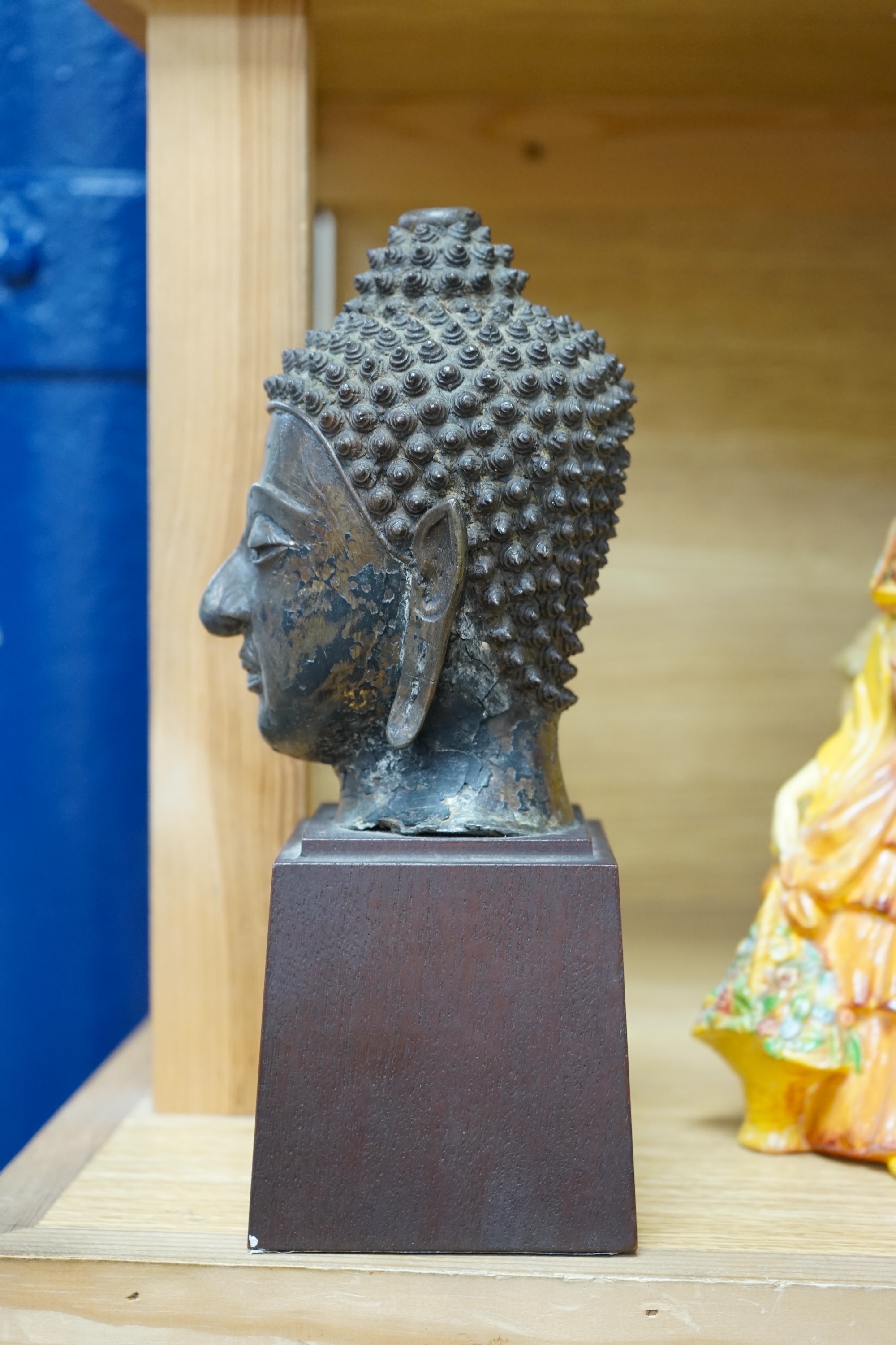 A Thai bronze head of Buddha, probably 18th century, 25cm high. Condition - good